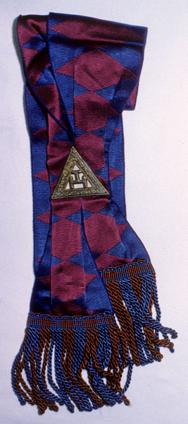 Photograph of Masonic scarf decorated with Triple Tau
